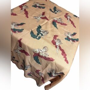 Vintage cherub tablecloth. Round 36” from centre